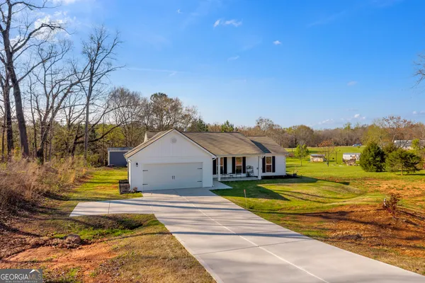 a view of a house with a swimming pool