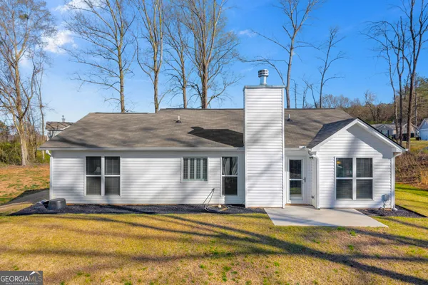 a view of a swimming pool with an outdoor space