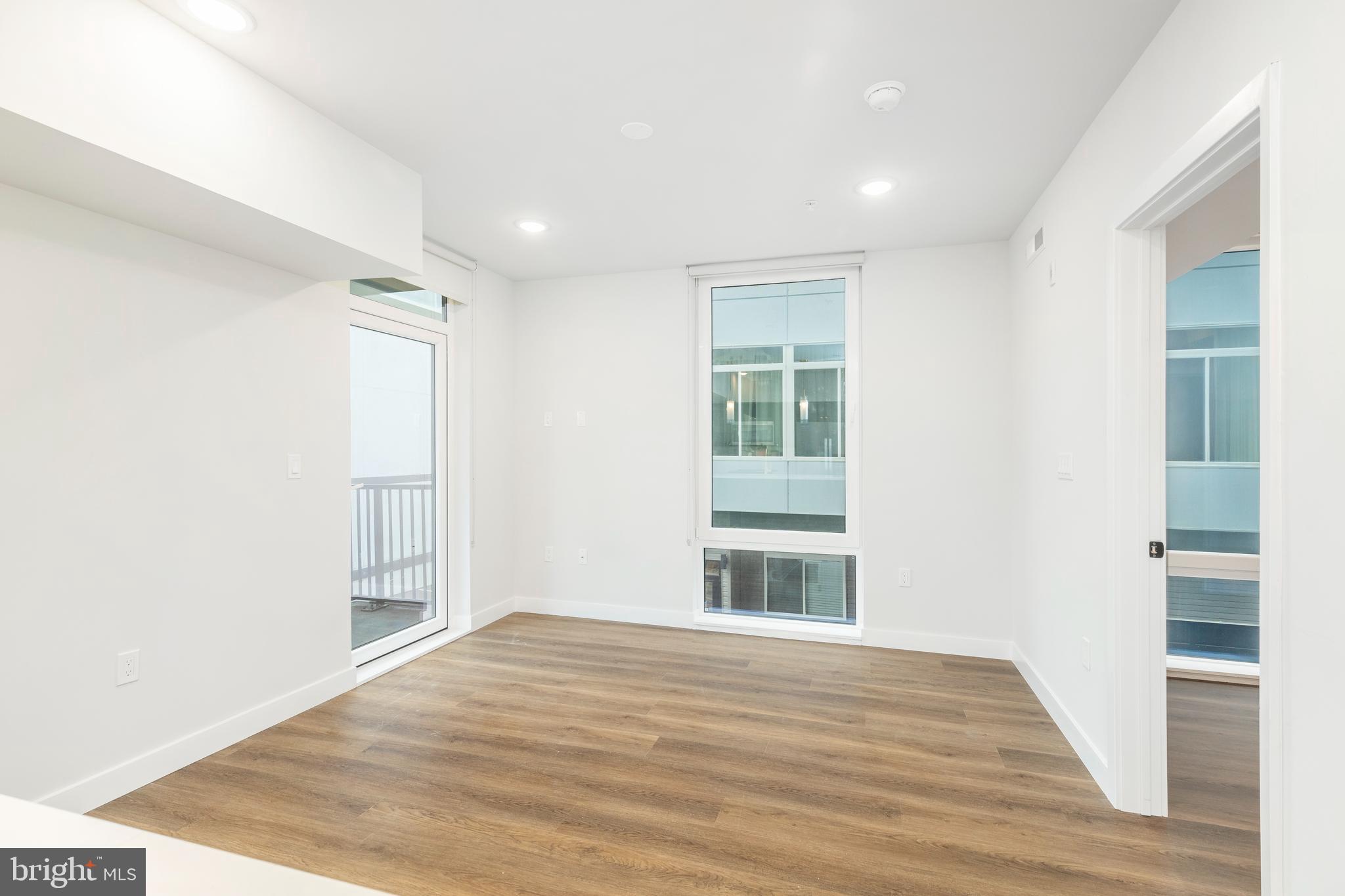 1102 Germantown Avenue, Unit 302 Philadelphia, PA 19123 - Photo 13 of 30 a view of empty room with wooden floor
