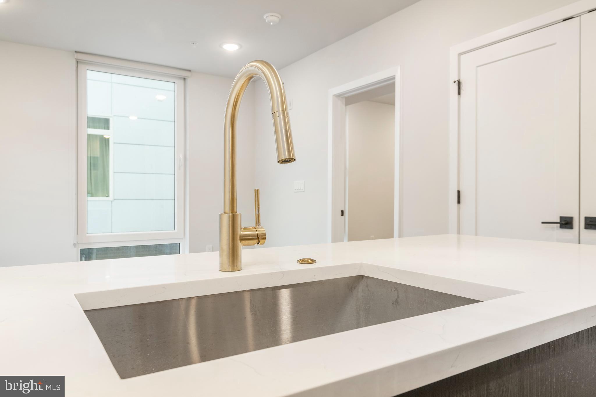 1102 Germantown Avenue, Unit 302 Philadelphia, PA 19123 - Photo 18 of 30 a view of a kitchen with a large window