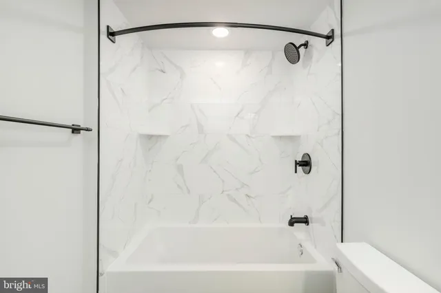 a bathroom with a bathtub