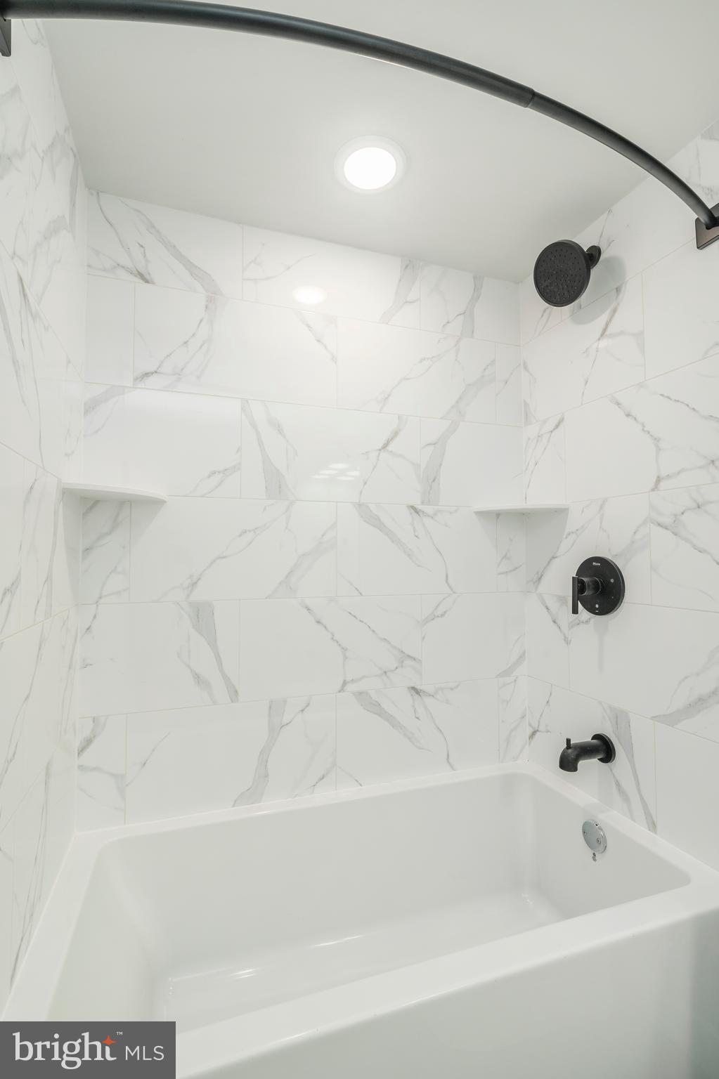 1102 Germantown Avenue, Unit 302 Philadelphia, PA 19123 - Photo 21 of 30 a bathroom with a bathtub