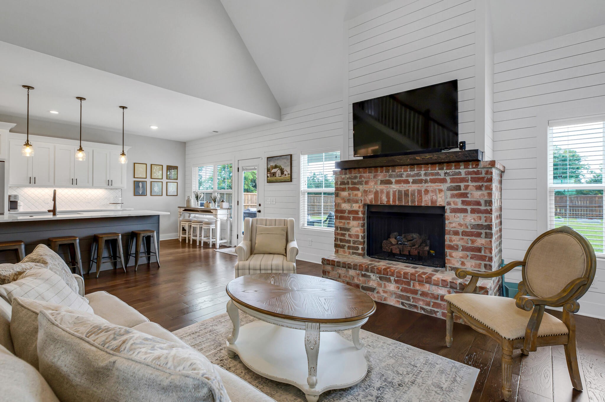 6570 Murfreesboro Road Lebanon, TN 37090 - Photo 13 of 28 a living room with furniture a flat screen tv and a fireplace