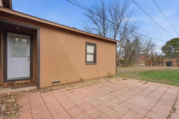 a view of a backyard of a house