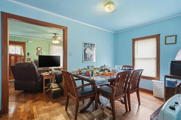 a view of a dining room with furniture