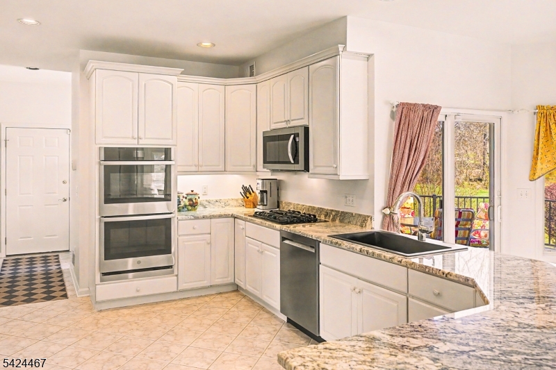 2 Moonlight Trail Flemington, NJ 08822 - Photo 13 of 50 a kitchen with granite countertop a stove a sink and a microwave