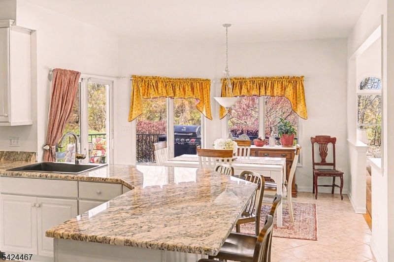 2 Moonlight Trail Flemington, NJ 08822 - Photo 16 of 50 a living room with a table or chairs and a wooden floor