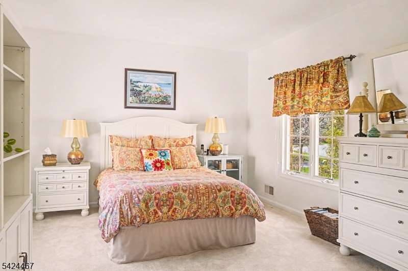 2 Moonlight Trail Flemington, NJ 08822 - Photo 24 of 50 a bedroom with a bed and a night stand