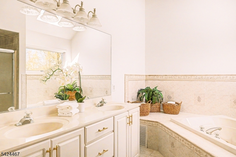 2 Moonlight Trail Flemington, NJ 08822 - Photo 33 of 50 a bathroom with a granite countertop sink and a large mirror