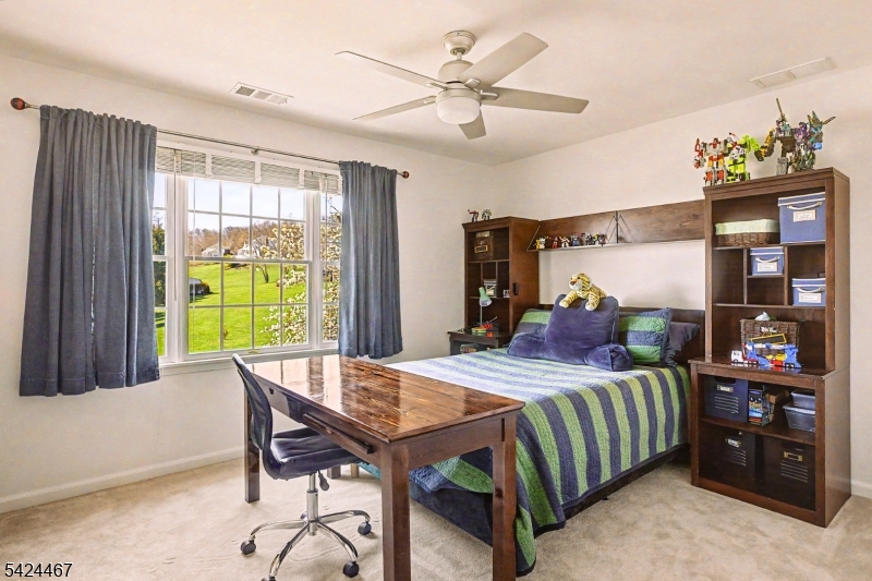 2 Moonlight Trail Flemington, NJ 08822 - Photo 34 of 50 a bed room with a bed and a table chair