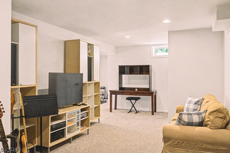 2 Moonlight Trail Flemington, NJ 08822 - Photo 42 of 50 a living room with furniture a flat screen tv and a window