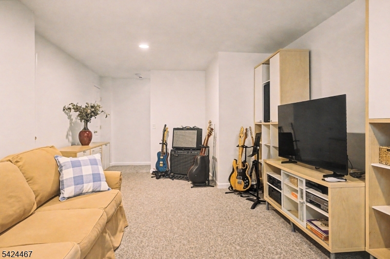 2 Moonlight Trail Flemington, NJ 08822 - Photo 43 of 50 a living room with furniture and a flat screen tv