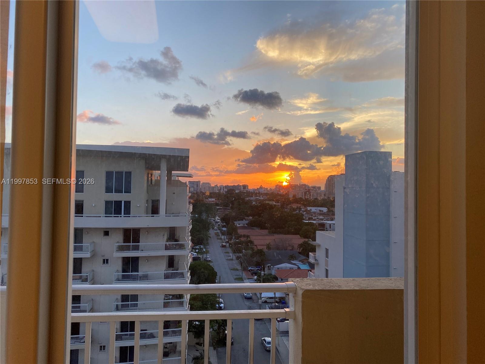 2425 Southwest 27th Avenue, Unit 1008 Miami, FL 33145 - Photo 18 of 20 a view of a balcony with an outdoor space