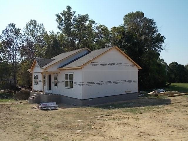1632 Holland Road Lafayette, TN 37083 - Photo 1 of 2 a view of a house with a yard