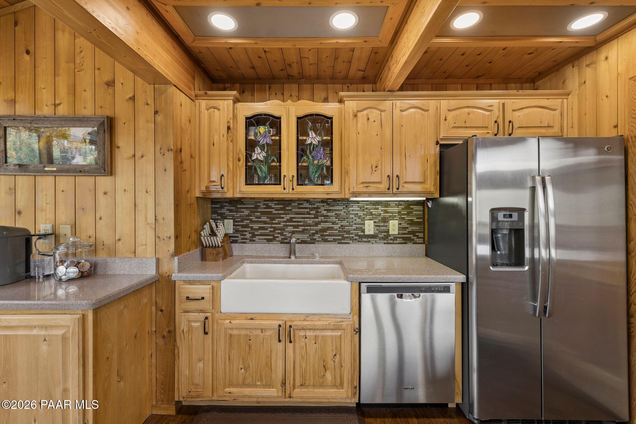 35 East Colonels Way Prescott, AZ 86303 - Photo 14 of 70 a kitchen with stainless steel appliances granite countertop a refrigerator and a stove