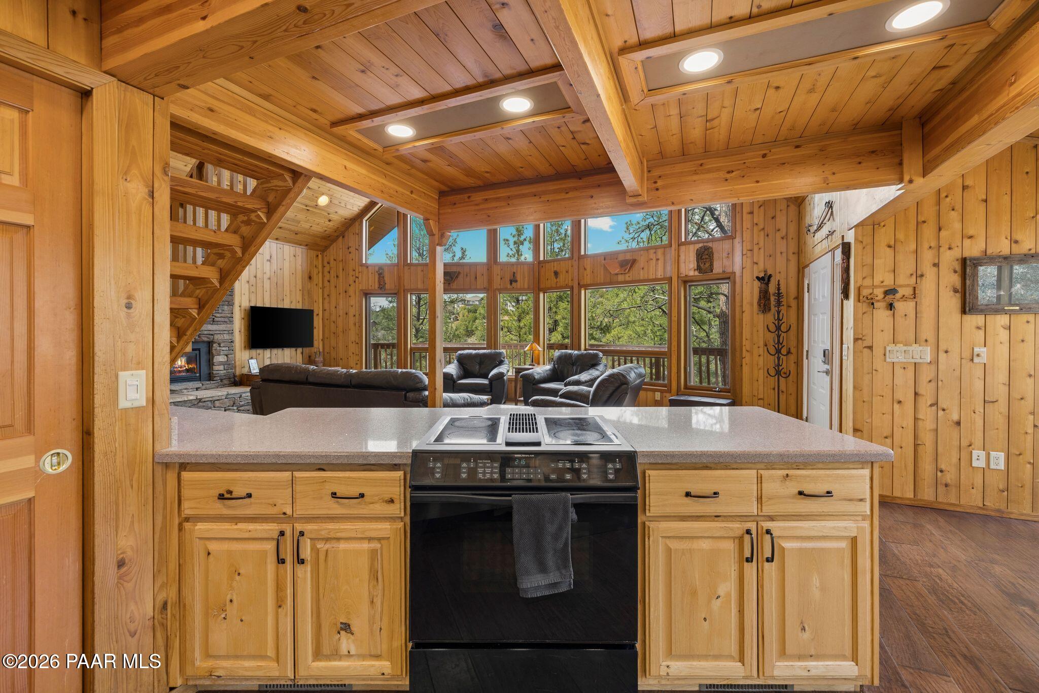 35 East Colonels Way Prescott, AZ 86303 - Photo 15 of 70 a kitchen with stainless steel appliances granite countertop a sink a stove and a wooden floors