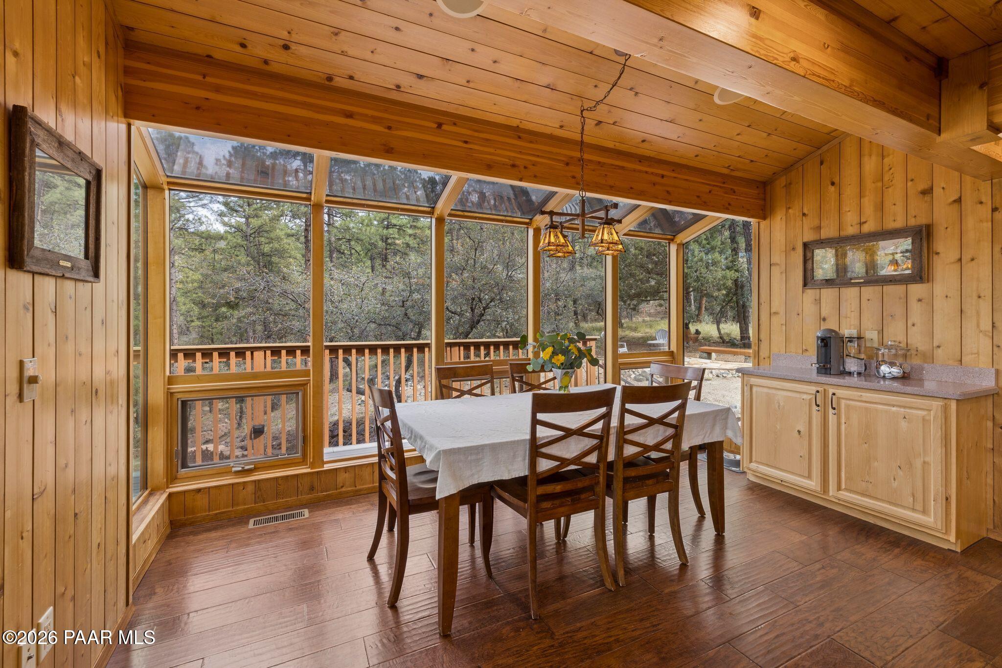 35 East Colonels Way Prescott, AZ 86303 - Photo 19 of 70 a dining room with furniture window wooden floor