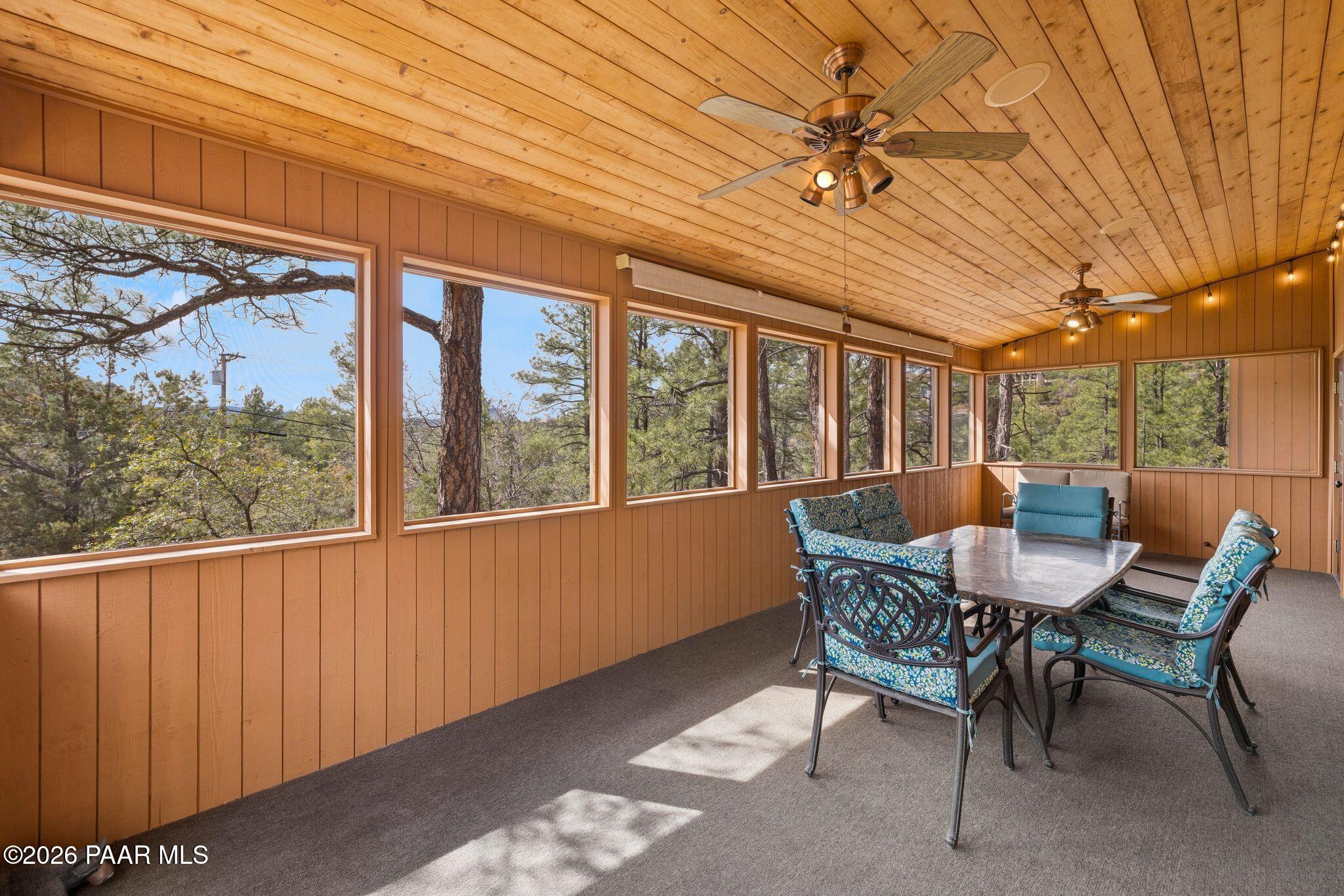 35 East Colonels Way Prescott, AZ 86303 - Photo 22 of 70 a view of a porch with furniture and a yard
