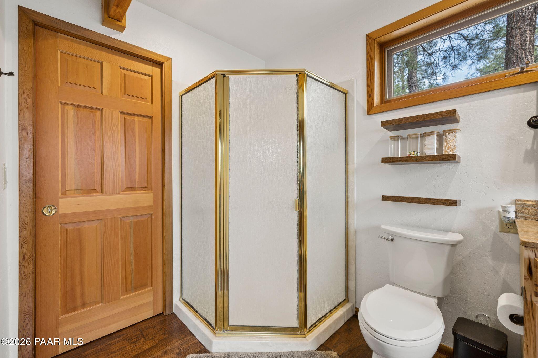 35 East Colonels Way Prescott, AZ 86303 - Photo 30 of 70 a white toilet sitting next to a bathroom