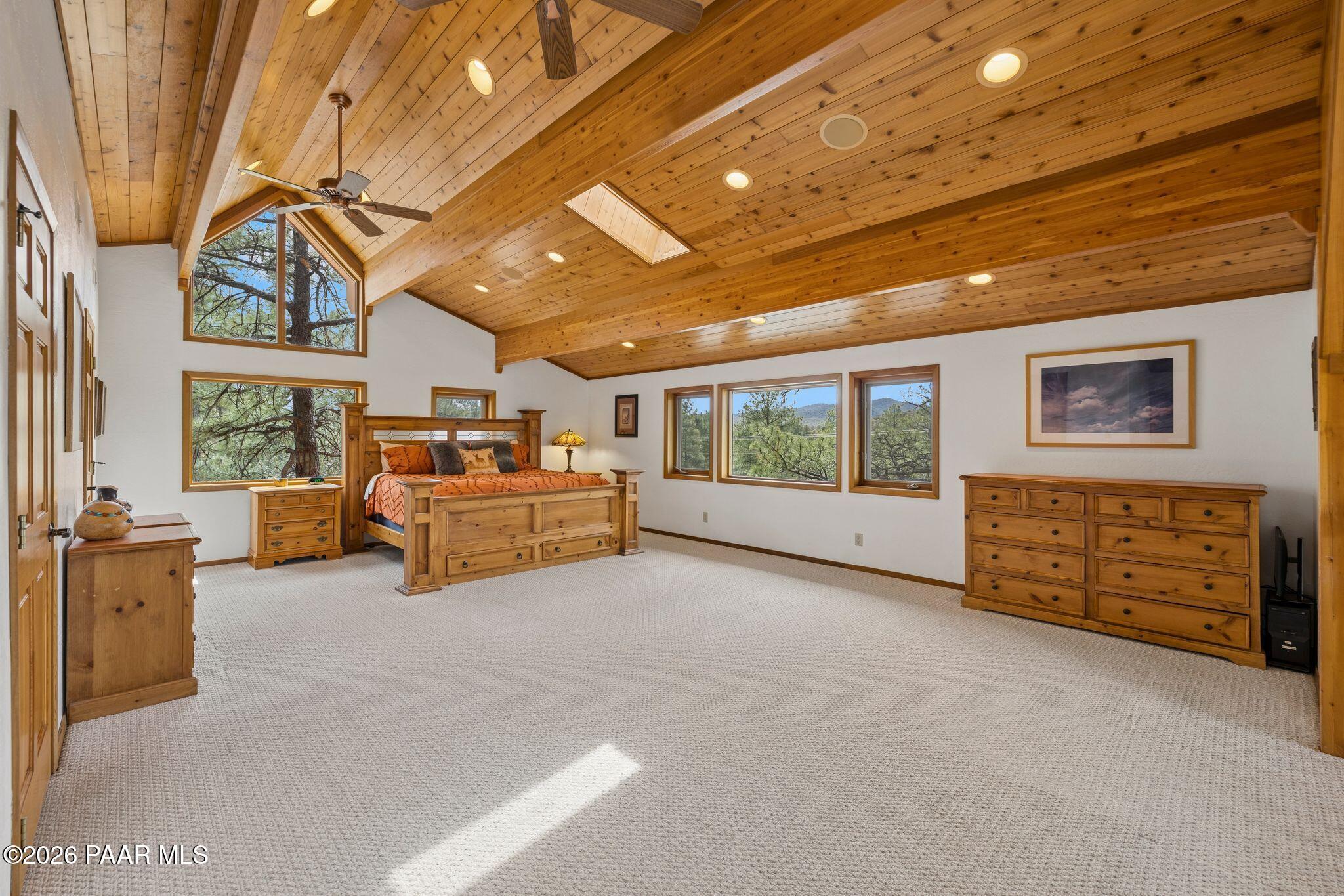 35 East Colonels Way Prescott, AZ 86303 - Photo 35 of 70 a bed room with furniture and a flat screen tv