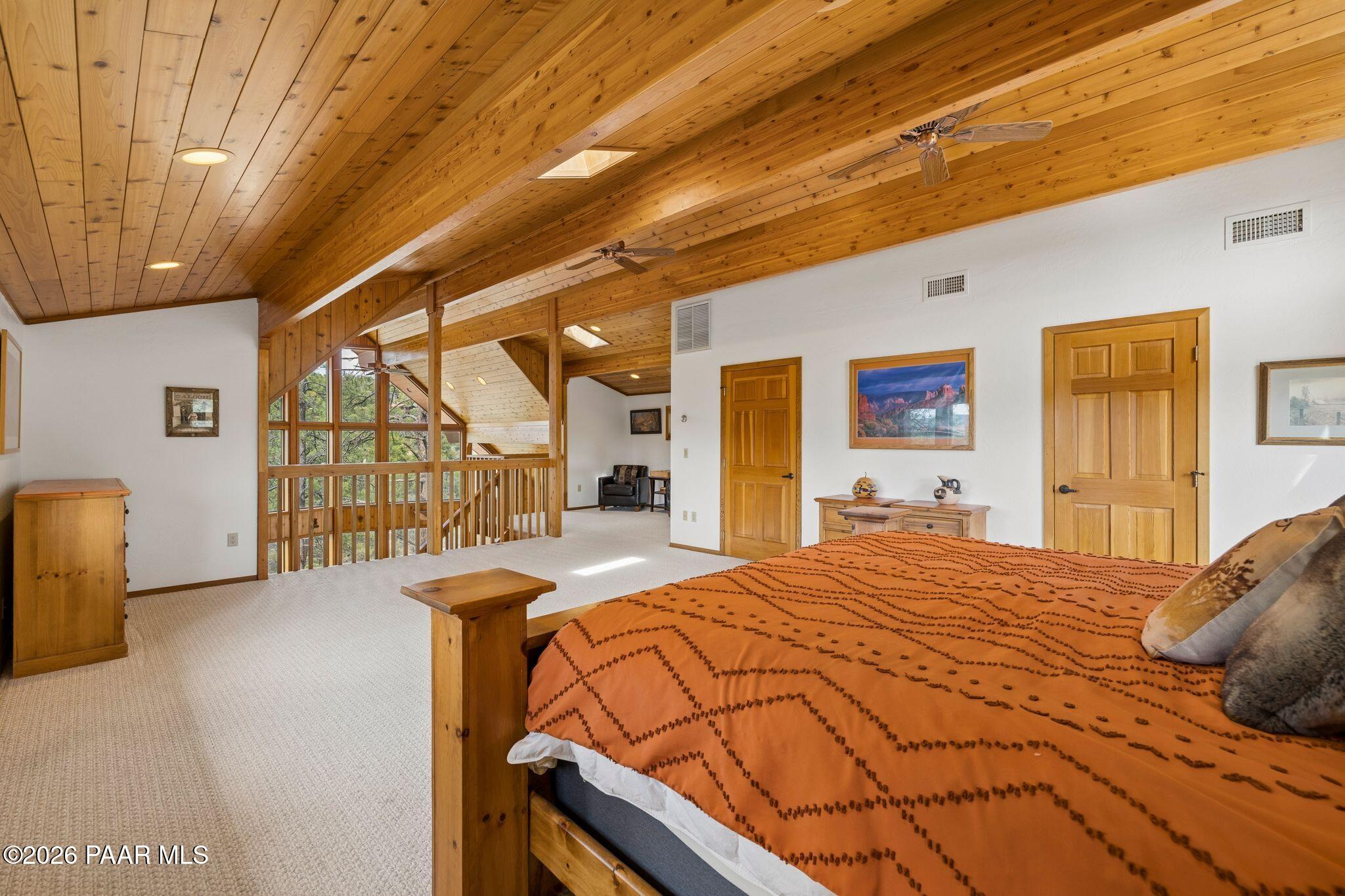 35 East Colonels Way Prescott, AZ 86303 - Photo 36 of 70 a bedroom with a bed and a large window