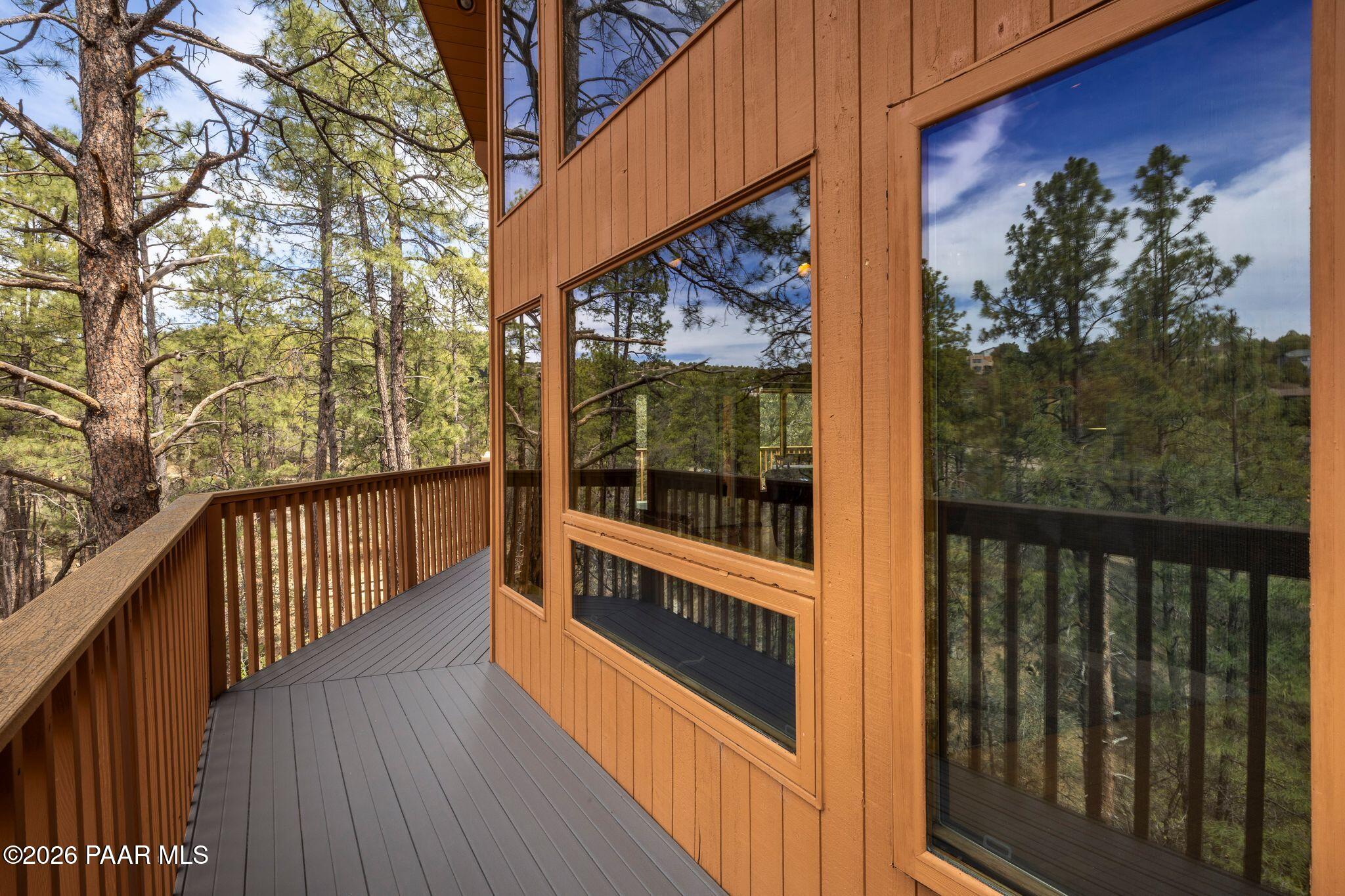 35 East Colonels Way Prescott, AZ 86303 - Photo 51 of 70 a view of a balcony with wooden floor and fence