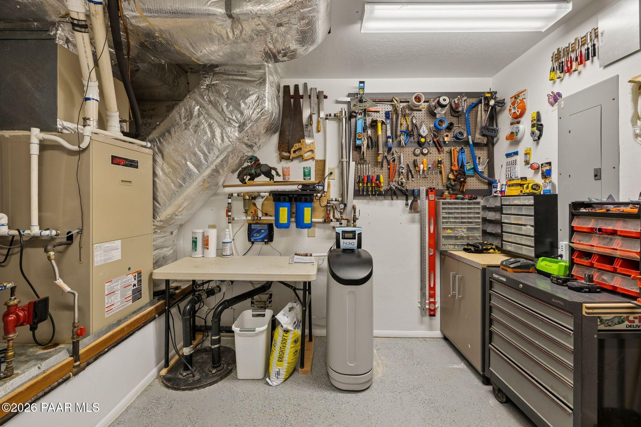 35 East Colonels Way Prescott, AZ 86303 - Photo 54 of 70 a view of walk in closet with clothes and shoes