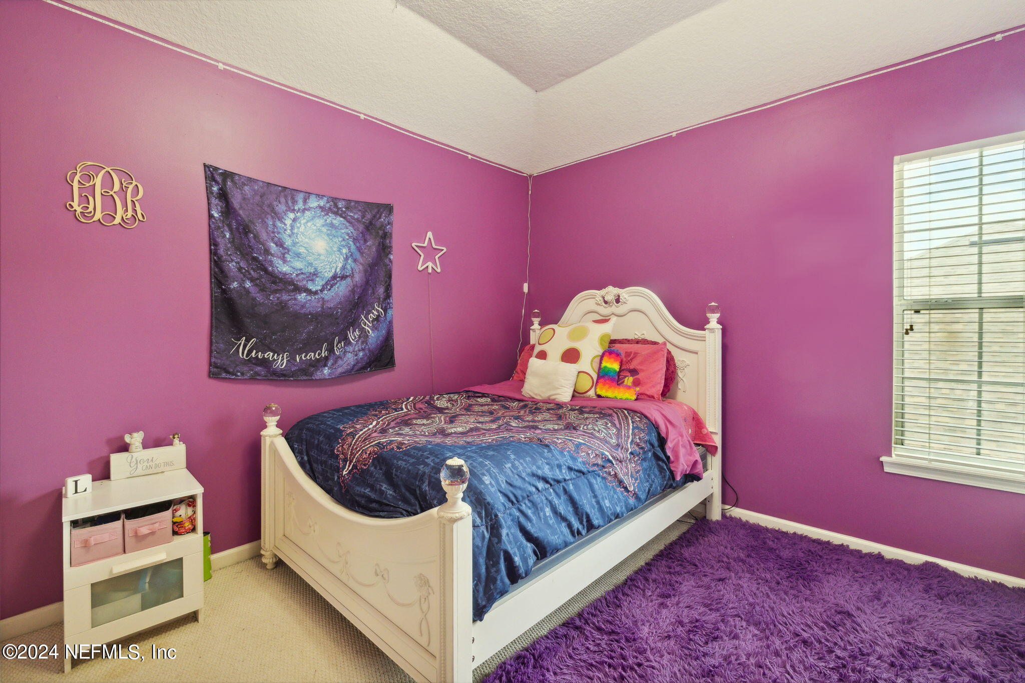 1403 Eagle Crossing Drive Orange Park, FL 32065 - Photo 26 of 71 a bedroom with a bed and a window