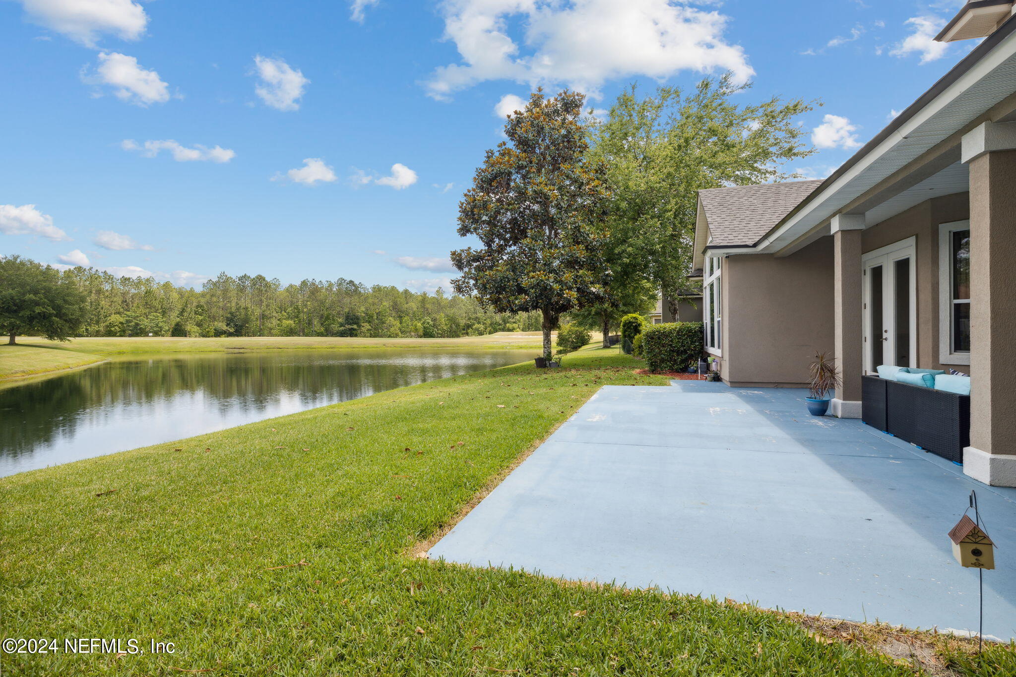 1403 Eagle Crossing Drive Orange Park, FL 32065 - Photo 28 of 71 a view of a house with a yard and a fountain