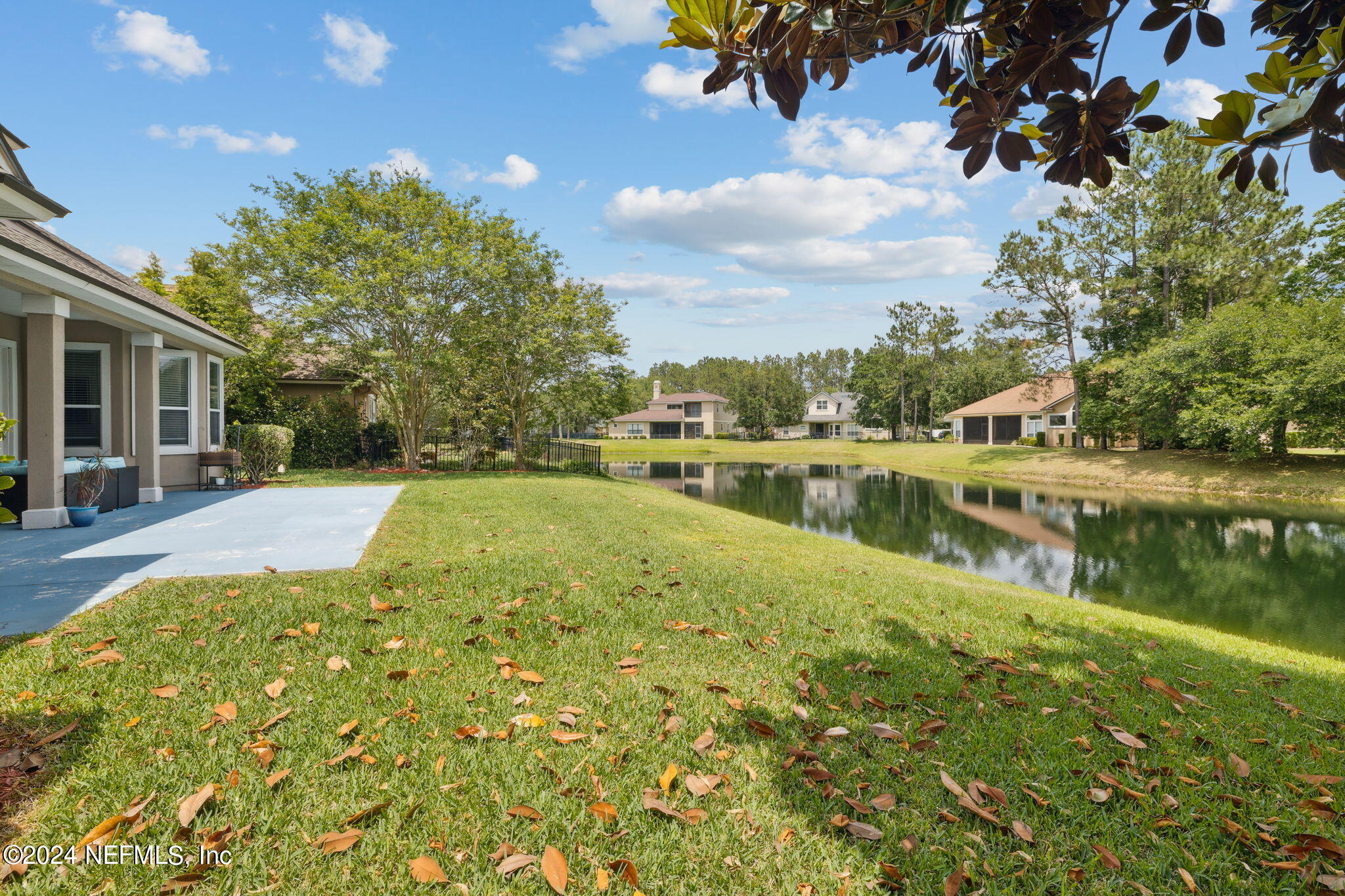 1403 Eagle Crossing Drive Orange Park, FL 32065 - Photo 31 of 71 a view of a lake with a house in the background