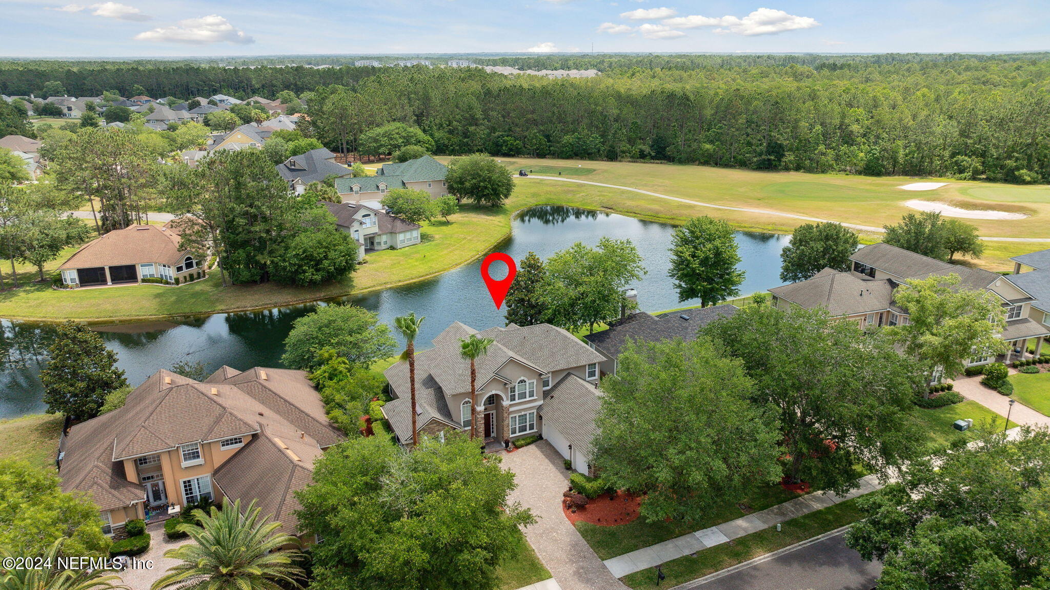 1403 Eagle Crossing Drive Orange Park, FL 32065 - Photo 38 of 71 an aerial view of a house with a garden