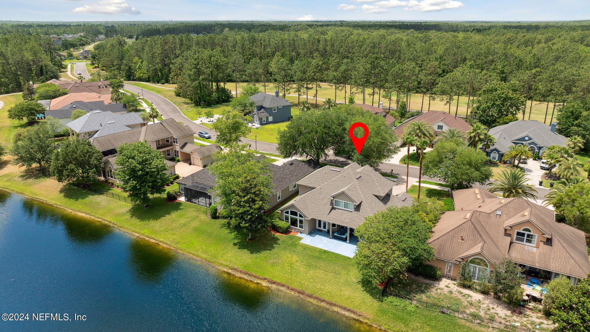 1403 Eagle Crossing Drive Orange Park, FL 32065 - Photo 39 of 71 an aerial view of a house with a lake view
