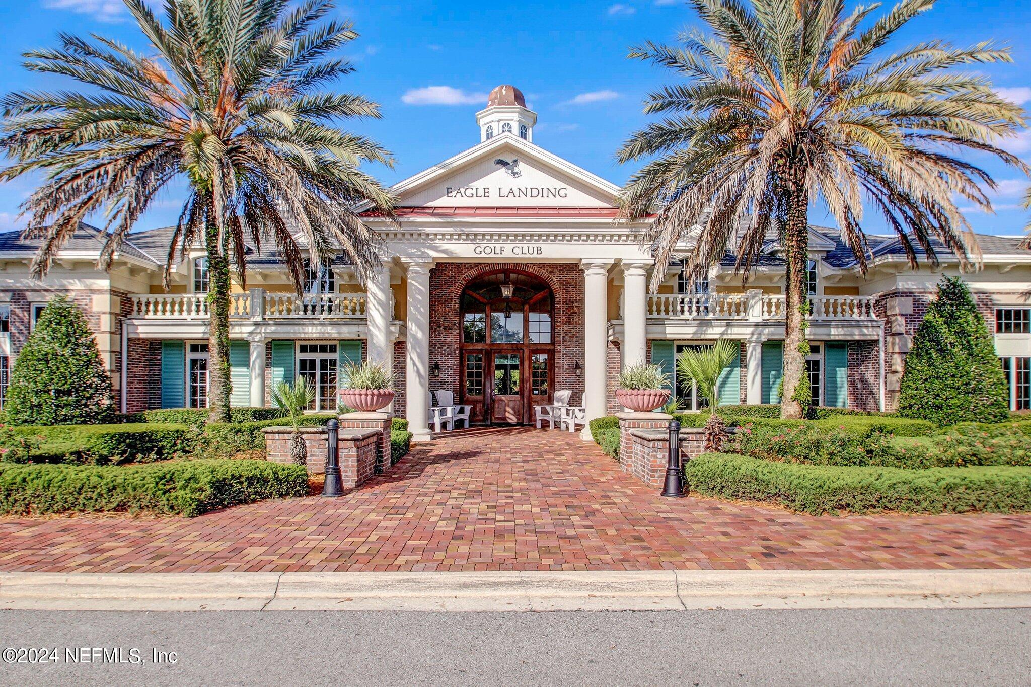1403 Eagle Crossing Drive Orange Park, FL 32065 - Photo 69 of 71 a front view of a house with yard and entryway