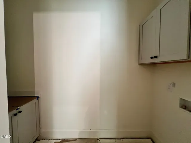 a utility room with a sink