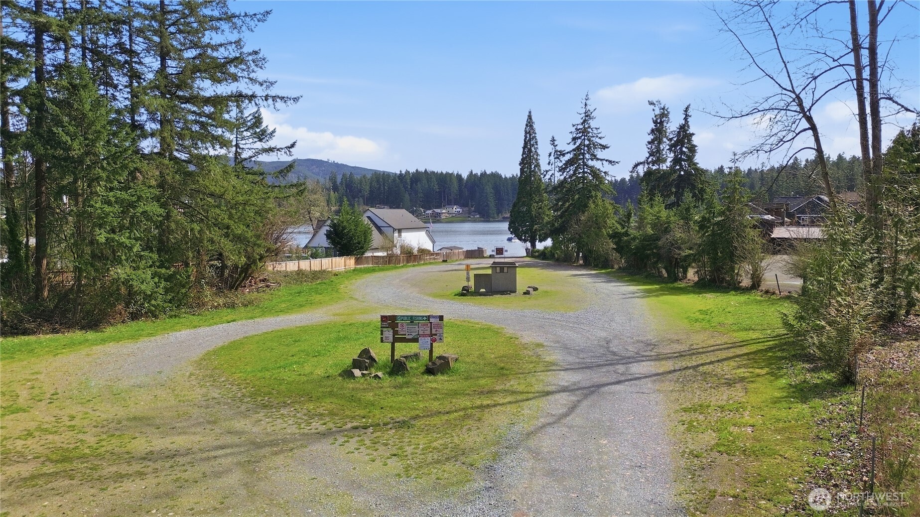0 West Clear Lake Road East Eatonville, WA 98328 - Photo 15 of 18 a view of a swimming pool with a yard and mountain view