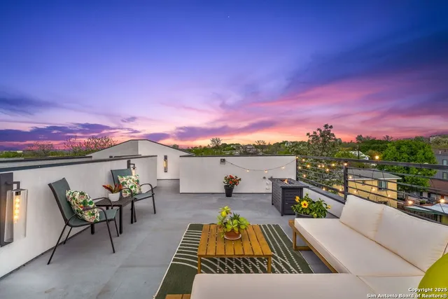 a view of roof deck with seating space