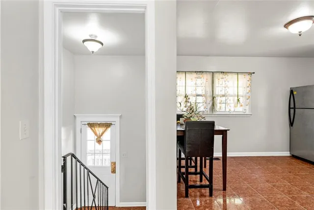 a view of a livingroom with furniture and window