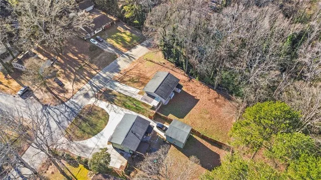 a view of residential houses with outdoor space