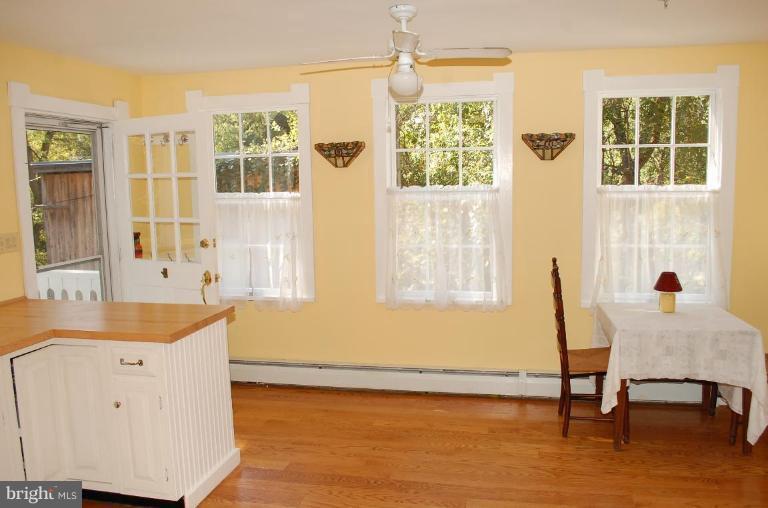 8448 Mercer Road Baldwin, MD 21013 - Photo 9 of 17 a living room with furniture and windows