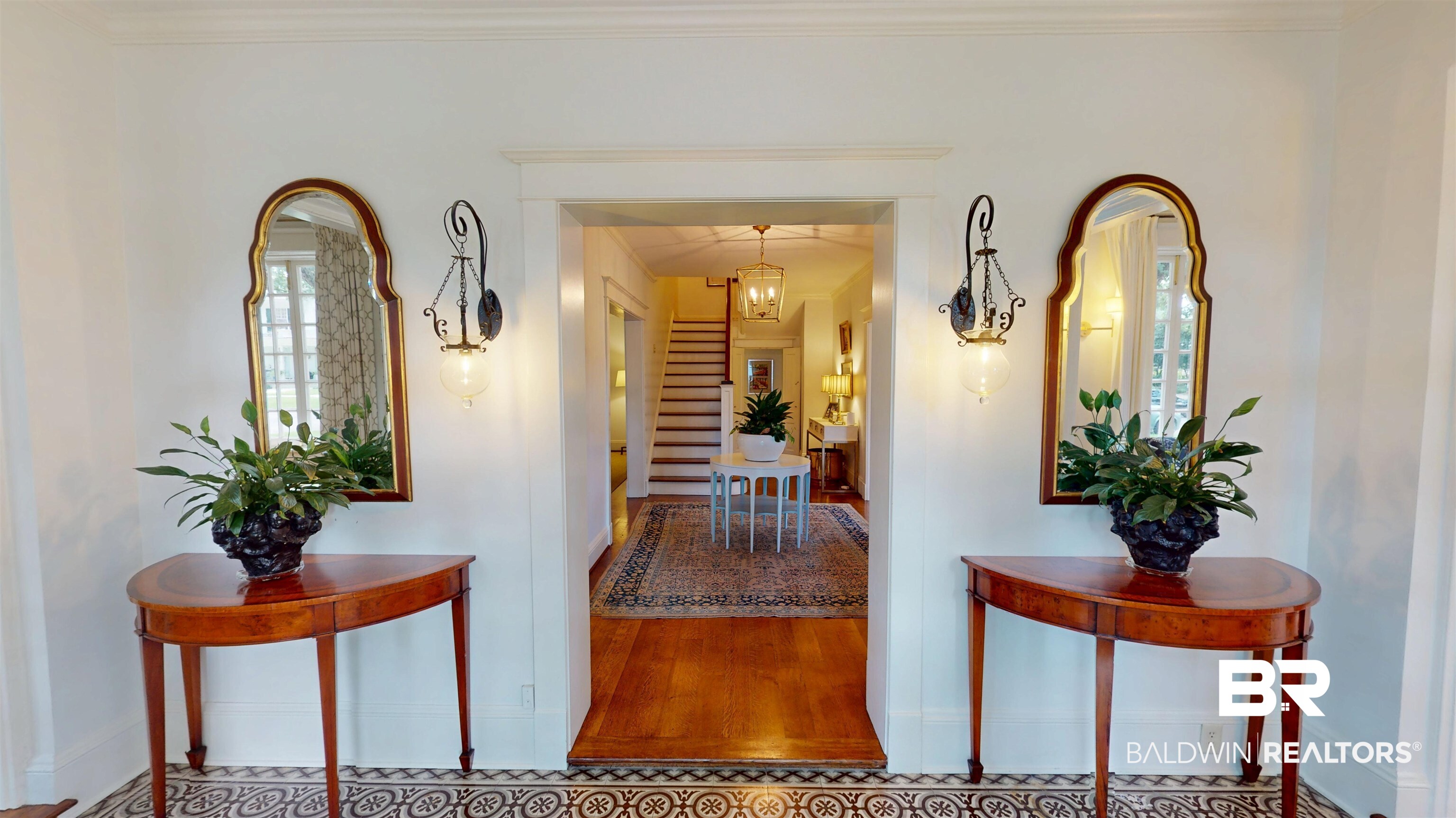 211 Lanier Avenue Mobile, AL 36607 - Photo 2 of 73 Hall with crown molding, wood finished floors, and stairway