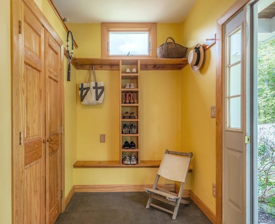 130 Argilla Road Ipswich, MA 01938 - Photo 31 of 42 a bathroom with a window and a chair