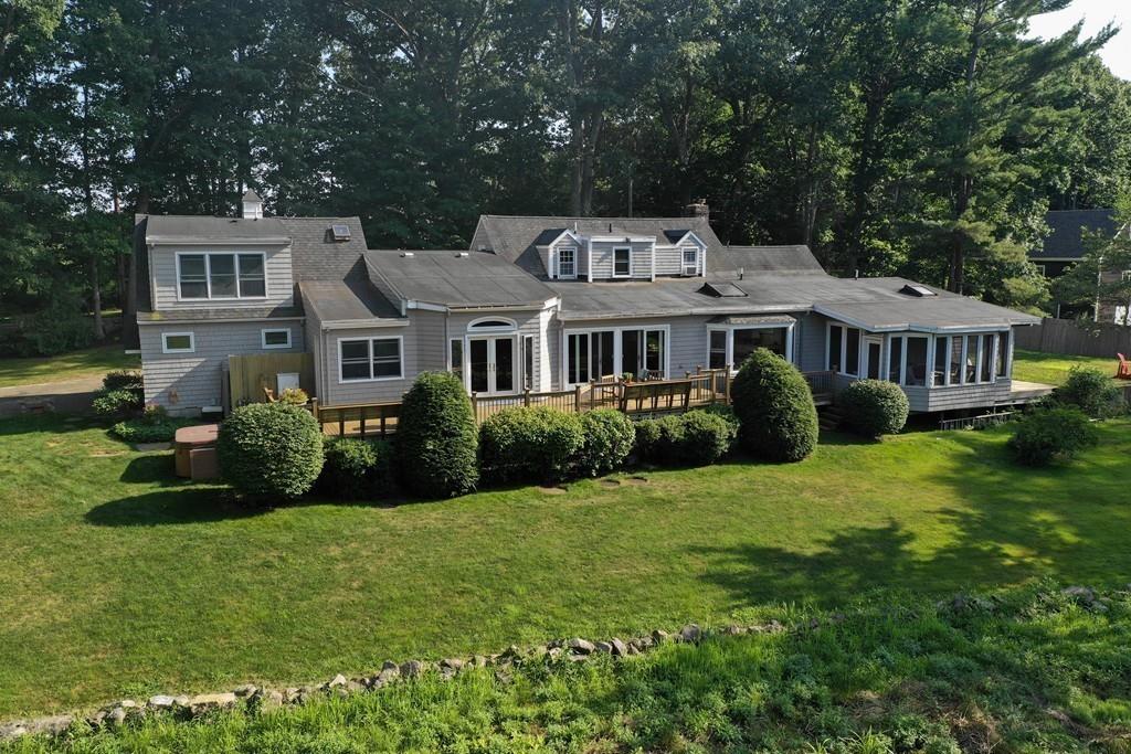 130 Argilla Road Ipswich, MA 01938 - Photo 40 of 42 a view of a house with a yard and plants