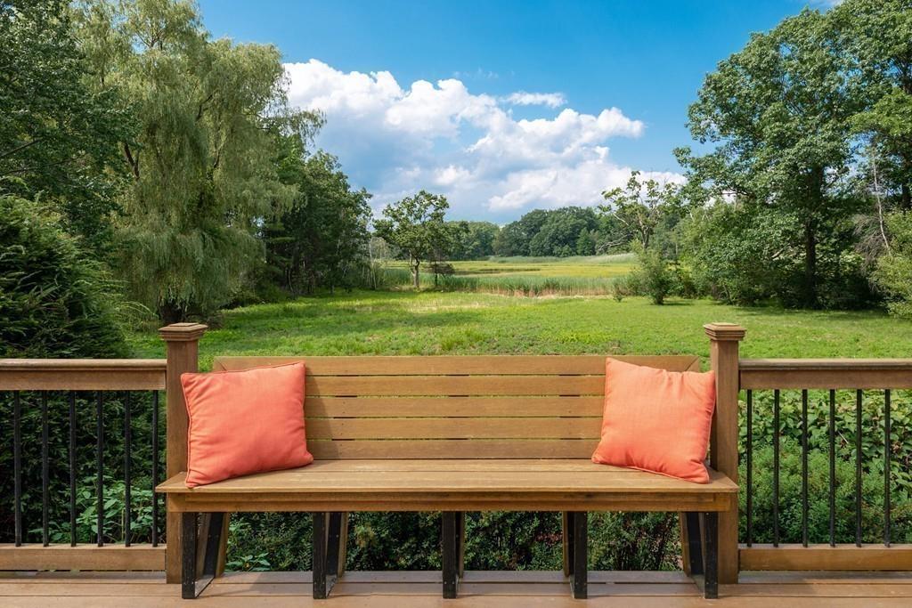130 Argilla Road Ipswich, MA 01938 - Photo 5 of 42 a view of a bench in the garden