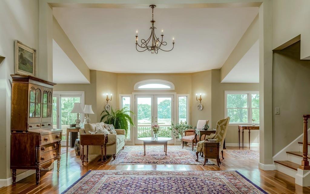 130 Argilla Road Ipswich, MA 01938 - Photo 6 of 42 a living room with furniture a window and a dining table
