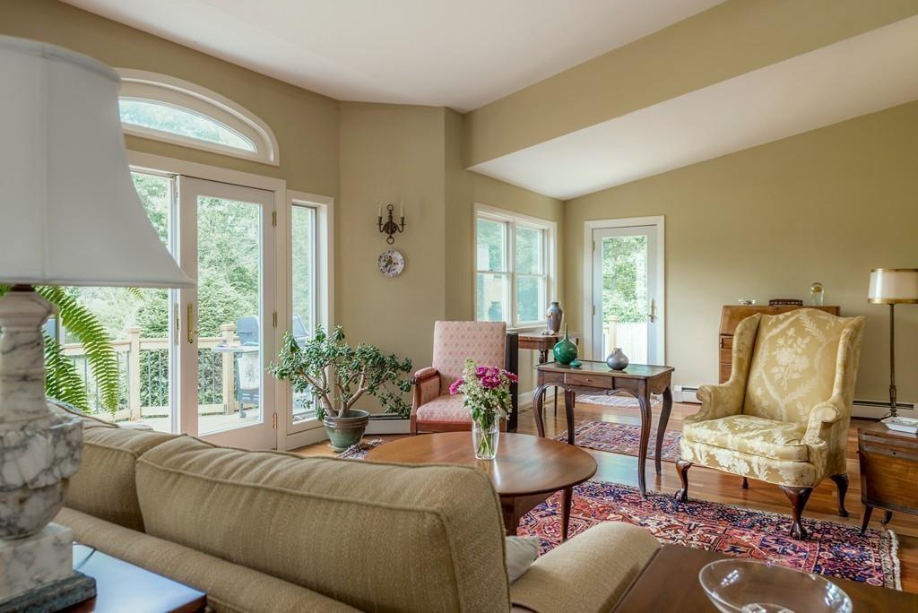 130 Argilla Road Ipswich, MA 01938 - Photo 10 of 42 a living room with furniture and a large window