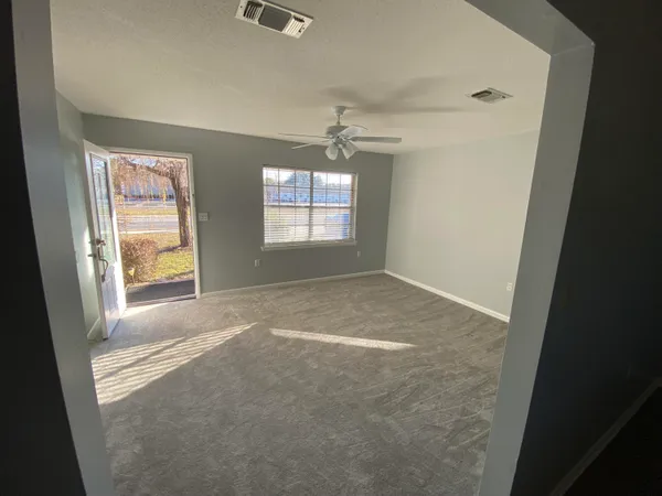 an empty room with windows