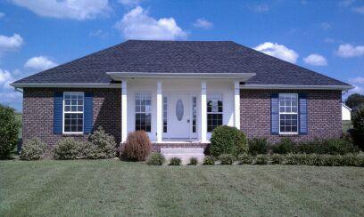 714 Lear Road Portland, TN 37148 - Photo 1 of 12 a front view of a house with a yard