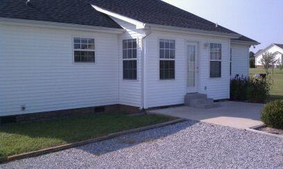 714 Lear Road Portland, TN 37148 - Photo 12 of 12 a view of a house with backyard and garden