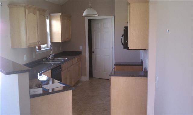 714 Lear Road Portland, TN 37148 - Photo 4 of 12 a bathroom with a sink and a mirror