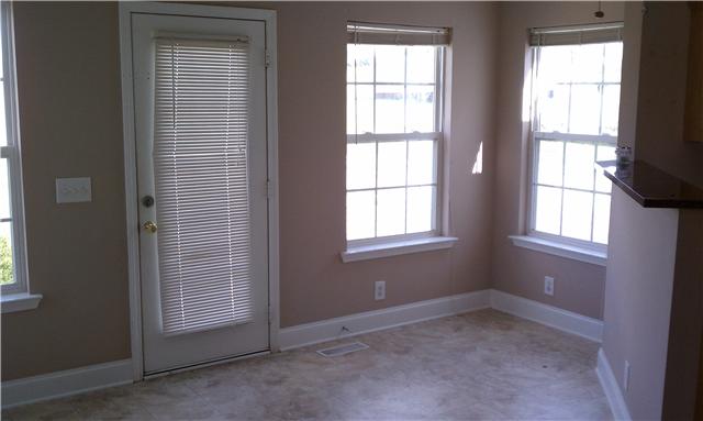 714 Lear Road Portland, TN 37148 - Photo 6 of 12 an empty room with windows
